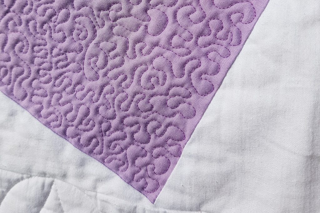 Detail quilt block quilting